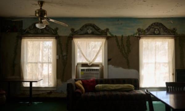 a room with windows and air condition unit