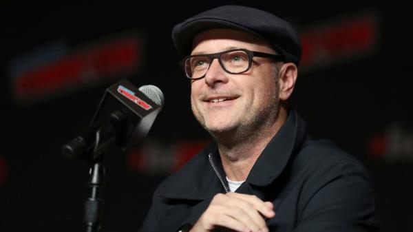 Matthew Vaughn speaks on stage during the 20th Century Fox Panel: An Insider's Look at "The King's Man" and "Free Guy" on the first day of New York Comic Con, Thursday, Oct. 3, 2019, in New York. (AP Photo/Steve Luciano)